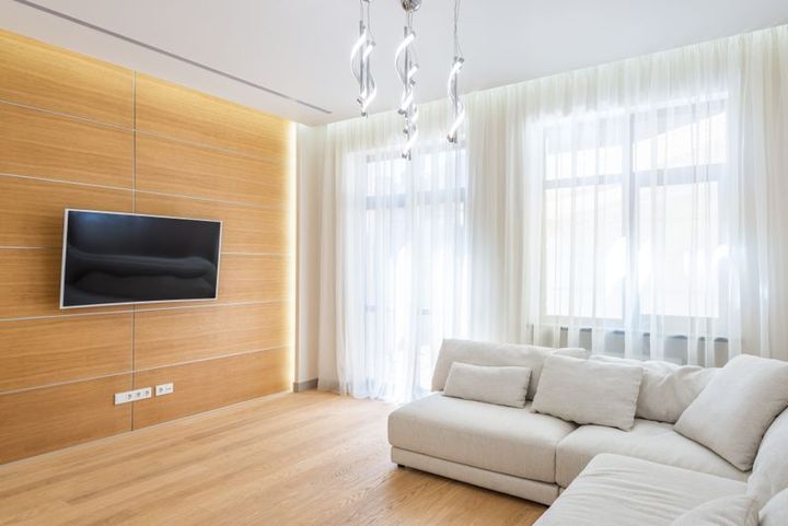 A wall-mounted flat-screen TV in a Wilkes-Barre living room